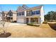 Attractive two-story home with brick, stone, two car garage, and a green front yard, showcasing a welcoming curb appeal at 555 Birkdale Dr, Fairburn, GA 30213