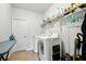 Functional laundry room equipped with modern washer and dryer at 555 Birkdale Dr, Fairburn, GA 30213