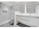 Bathroom features marble shower, dual sink vanity, and modern fixtures at 213 Tuxworth Cir, Decatur, GA 30033