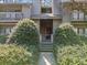 Exterior view of building with lush greenery, stairs leading up to the front doors at 213 Tuxworth Cir, Decatur, GA 30033
