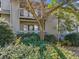 Exterior building view with well-kept landscaping and balconies at 213 Tuxworth Cir, Decatur, GA 30033