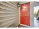 Exterior view of a vibrant red front door with the address 213 at 213 Tuxworth Cir, Decatur, GA 30033
