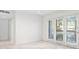 Bright living room featuring marble floors and large windows at 213 Tuxworth Cir, Decatur, GA 30033