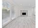 Bright living room featuring a fireplace and a sliding glass door at 213 Tuxworth Cir, Decatur, GA 30033