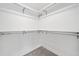 Empty walk-in closet featuring chrome closet rods at 213 Tuxworth Cir, Decatur, GA 30033