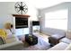 This inviting living room features a vaulted ceiling, large windows, and a cozy seating area, perfect for relaxing at 86 Kelly Ct, Dallas, GA 30157