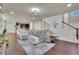 Spacious living room with open floor plan, connecting seamlessly to the kitchen and dining areas at 194 Lakestone Parkway, Woodstock, GA 30188
