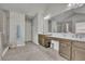 Main bathroom featuring a double vanity, a glass shower, and gray tile flooring at 194 Lakestone Parkway, Woodstock, GA 30188