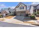 Charming two-story home with a two-car garage and a beautifully landscaped front yard at 441 Highlands Loop, Woodstock, GA 30188