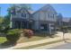 Charming home featuring well-maintained landscaping and a two-car garage at 441 Highlands Loop, Woodstock, GA 30188