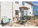Charming patio with outdoor seating, perfect for enjoying a meal or relaxing outdoors at 441 Highlands Loop, Woodstock, GA 30188