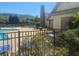Well-maintained community pool with mountain views, featuring lounge chairs and fencing at 441 Highlands Loop, Woodstock, GA 30188