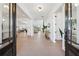 Spacious foyer with hardwood floors and an open floor plan at 7560 Wild Violet Dr, Cumming, GA 30040