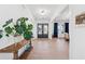 Bright foyer with hardwood floors and elegant decor at 7560 Wild Violet Dr, Cumming, GA 30040