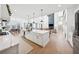 Open floor plan view of the kitchen with seamless transition to the living area at 7560 Wild Violet Dr, Cumming, GA 30040