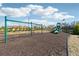 Community playground with swings and slide with rubber mulch at 7560 Wild Violet Dr, Cumming, GA 30040