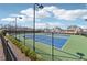 Well-maintained tennis courts enhance the active lifestyle in this community at 7560 Wild Violet Dr, Cumming, GA 30040