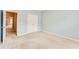 Light blue bedroom featuring carpet flooring and a closet at 215 Aldridge Pl # 9, Smyrna, GA 30082