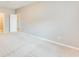 Spacious bedroom with neutral walls and carpet, adjoined by a doorway to a closet space at 215 Aldridge Pl # 9, Smyrna, GA 30082