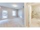 Bedroom with natural light, plush carpeting and an en suite bathroom with a walk in shower at 215 Aldridge Pl # 9, Smyrna, GA 30082