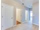 Hallway with neutral carpeting, paint, and white doors in a home interior at 215 Aldridge Pl # 9, Smyrna, GA 30082