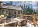 View of the back deck with outdoor dining and screened-in porch, perfect for entertaining at 3493 Maryhill Nw Ln, Kennesaw, GA 30152