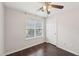 Well-lit bedroom with a ceiling fan and a window at 85 Windward Dr, Covington, GA 30016