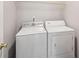 Laundry room with washer and dryer included at 85 Windward Dr, Covington, GA 30016