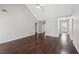 Bright living room featuring hardwood floors and a vaulted ceiling with a fan at 85 Windward Dr, Covington, GA 30016