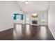 Spacious living room featuring vaulted ceiling, a fireplace, and lots of natural light at 85 Windward Dr, Covington, GA 30016