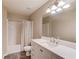 Bathroom with a granite countertop vanity, tile floors, and shower and tub combination at 2479 Brynfield Cv, Suwanee, GA 30024