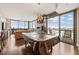 Bright living room boasting floor-to-ceiling windows with city views and a pool table at 270 17Th Nw St # 1113, Atlanta, GA 30363