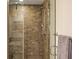 Shower with glass door and stone tiling at 270 17Th Nw St # 1113, Atlanta, GA 30363