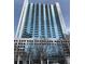 Modern high-rise building with glass facade and multiple balconies offering city views at 3324 Peachtree Ne Rd # 1116, Atlanta, GA 30326