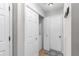 Hallway with storage and laundry, offering functionality and convenience at 503 Stanford Pl, Woodstock, GA 30188