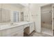 Bright bathroom boasts double sinks, a spacious countertop, and a separate shower/tub room for added convenience at 5515 Punkintown Rd, Douglasville, GA 30135