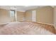 Bedroom with neutral paint and carpet plus a window at 5515 Punkintown Rd, Douglasville, GA 30135