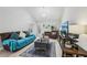 Bright and airy living room with comfortable seating, fireplace, and natural light from the beautiful window at 960 Sugar Meadow Dr, Sugar Hill, GA 30518