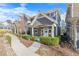 Charming two-story home with covered porch, manicured landscaping, and a welcoming front entrance at 196 Wingo St, Norcross, GA 30071