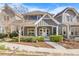 Beautiful craftsman-style home featuring a covered porch, trimmed landscaping, and inviting curb appeal at 196 Wingo St, Norcross, GA 30071