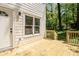 Wooden back porch off a house with green surroundings and siding at 2453 Paul Nw Ave, Atlanta, GA 30318