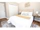 Cozy bedroom featuring a plush bed, stylish decor, and ample natural light at 2453 Paul Nw Ave, Atlanta, GA 30318