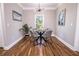 Dining room showcases hardwood flooring, modern lighting fixture and table that seats four at 2453 Paul Nw Ave, Atlanta, GA 30318