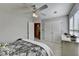 Bright bedroom with a closet and neutral colored walls at 5030 New Chapel Hill Way, Cumming, GA 30041