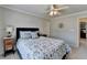 Bedroom showcasing stylish decor and neutral color scheme at 5030 New Chapel Hill Way, Cumming, GA 30041