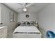 Cozy bedroom with a ceiling fan and light gray walls at 5030 New Chapel Hill Way, Cumming, GA 30041