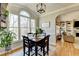 Bright breakfast nook featuring natural light, a wooden table, and cozy seating at 5030 New Chapel Hill Way, Cumming, GA 30041