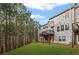 Green backyard with deck and view of the trees; great for privacy and outdoor living at 5975 Vista Brook Dr, Suwanee, GA 30024