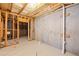 Unfinished basement showcasing the home's structure and systems at 5975 Vista Brook Dr, Suwanee, GA 30024