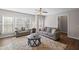 Living room with lots of natural light and neutral-toned furniture at 5975 Vista Brook Dr, Suwanee, GA 30024